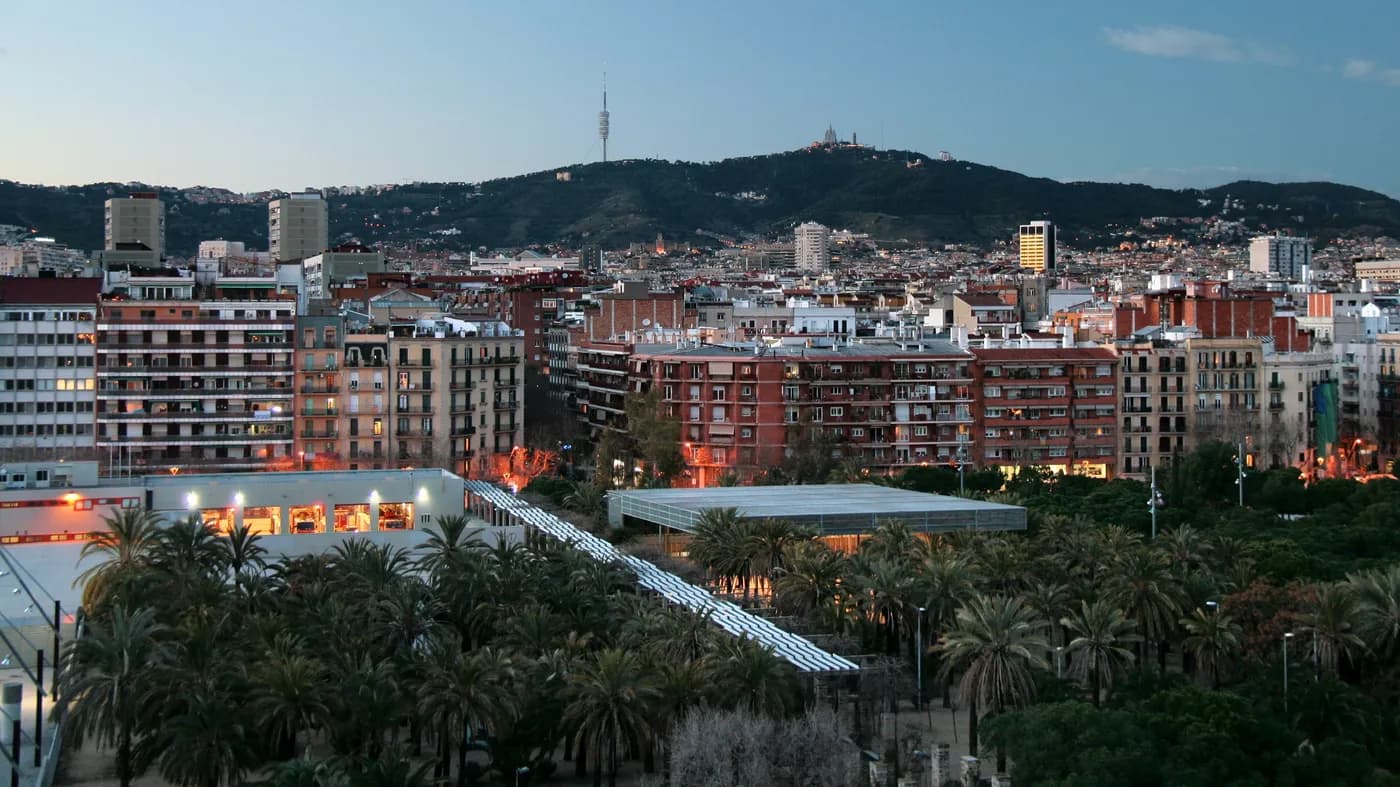 Barcelona cityscape beneath surrounding hills